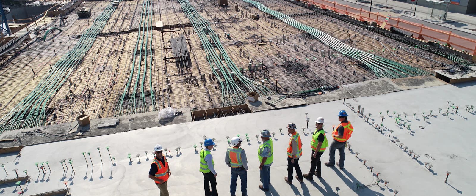 Construction team coordinating work on an active project